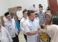 Bupati Pringsewu Salurkan Bantuan Pangan untuk 693 Warga Pekon Rejosari