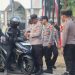 Jelang HUT RI ke-81, Polres Lampung Selatan Tebar Ratusan Bendera Merah Putih ke Warga